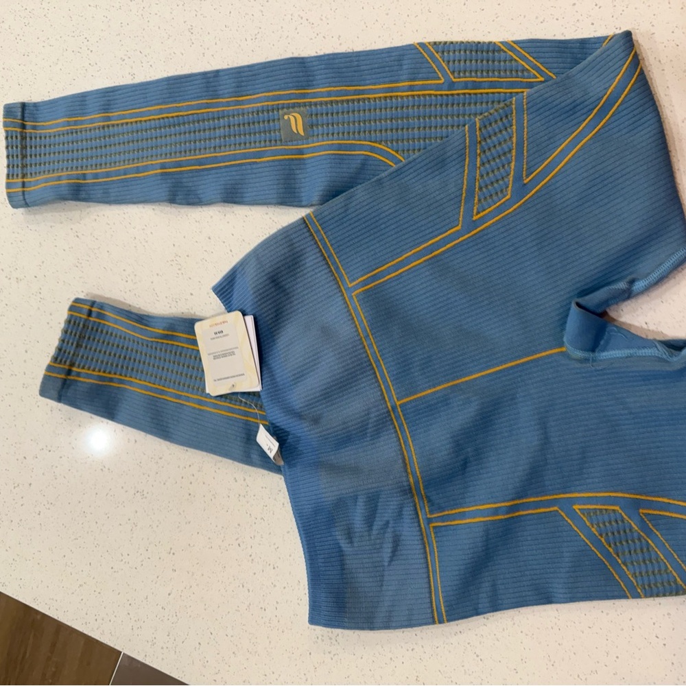 Fabletics Kids Leggings in Blue with Yellow Accents